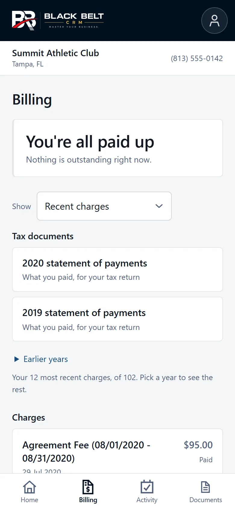 The member portal Billing screen on a phone: the business name and phone at the top, a card reading You're all paid up, links to the 2020 and 2019 statements of payments, and the start of the list of recent charges.