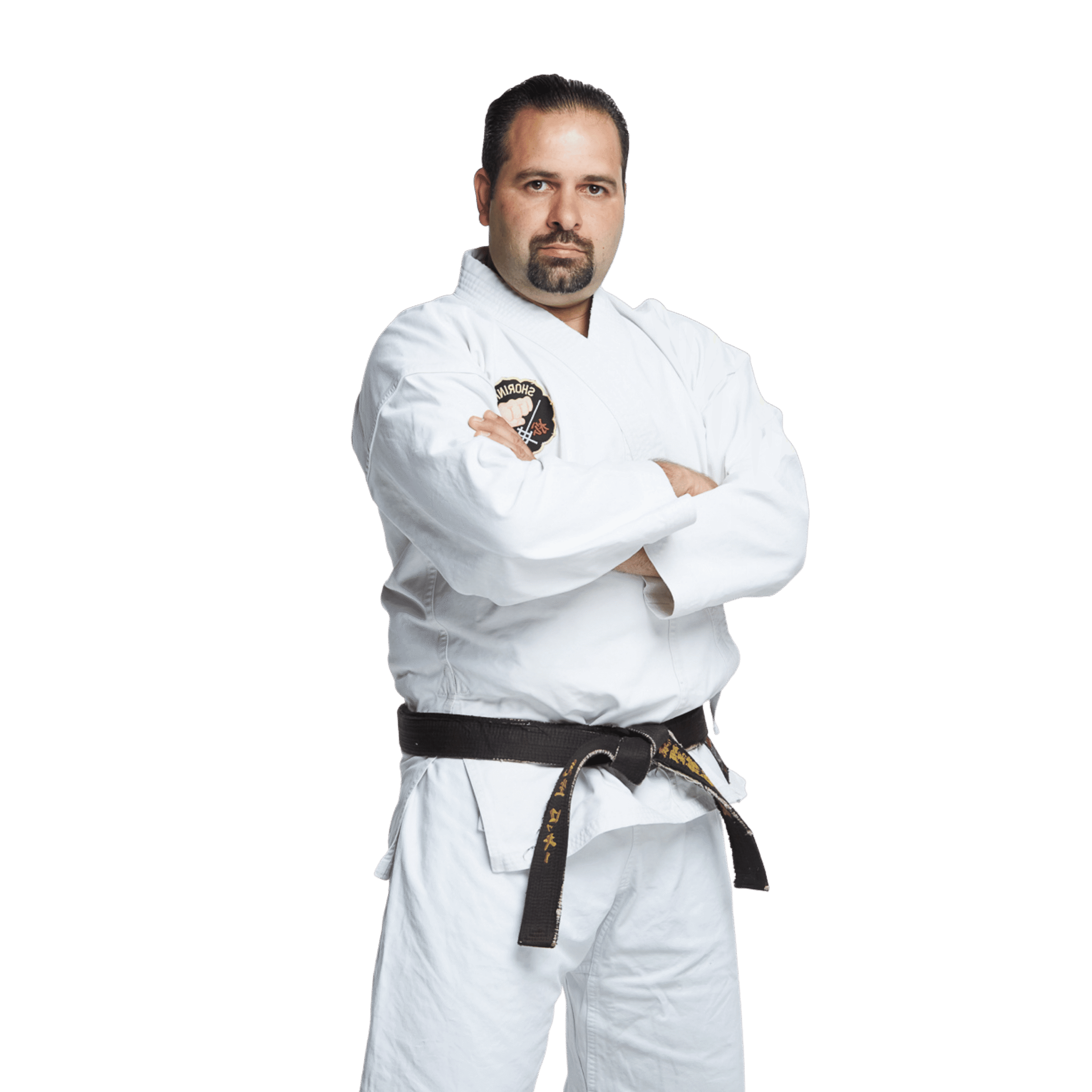 Shihan Rocky Catala wearing a martial arts uniform, demonstrating expertise in Goju Ryu and Shorin Ryu Karate.